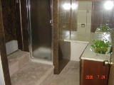 Full bath with stone jucuzzi tub and separate shower